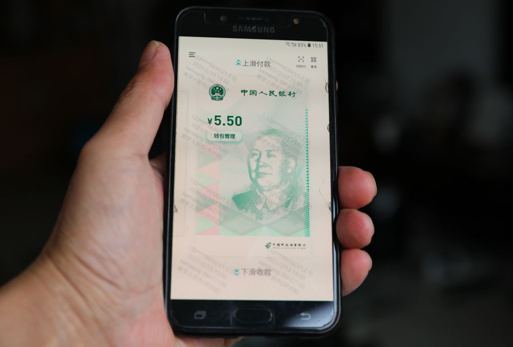 TANGSHAN, CHINA - FEBRUARY 13, 2021 - A digital Chinese currency is displayed on a mobile phone interface in Tangshan, Hebei province, China, Feb 13, 2021. In order to adapt to the rapid development of electronic payments, China's digital yuan has entered a rapid pilot stage.- PHOTOGRAPH BY Costfoto / Barcroft Studios / Future Publishing (Photo credit should read Costfoto/Barcroft Media via Getty Images)