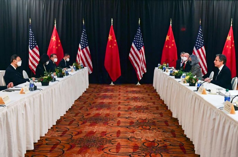 TOPSHOT - US Secretary of State Antony Blinken (2nd R), joined by National Security Advisor Jake Sullivan (R), speaks while facing Yang Jiechi (2nd L), director of the Central Foreign Affairs Commission Office, and Wang Yi (L), China's Foreign Minister at the opening session of US-China talks at the Captain Cook Hotel in Anchorage, Alaska on March 18, 2021. - China's actions 