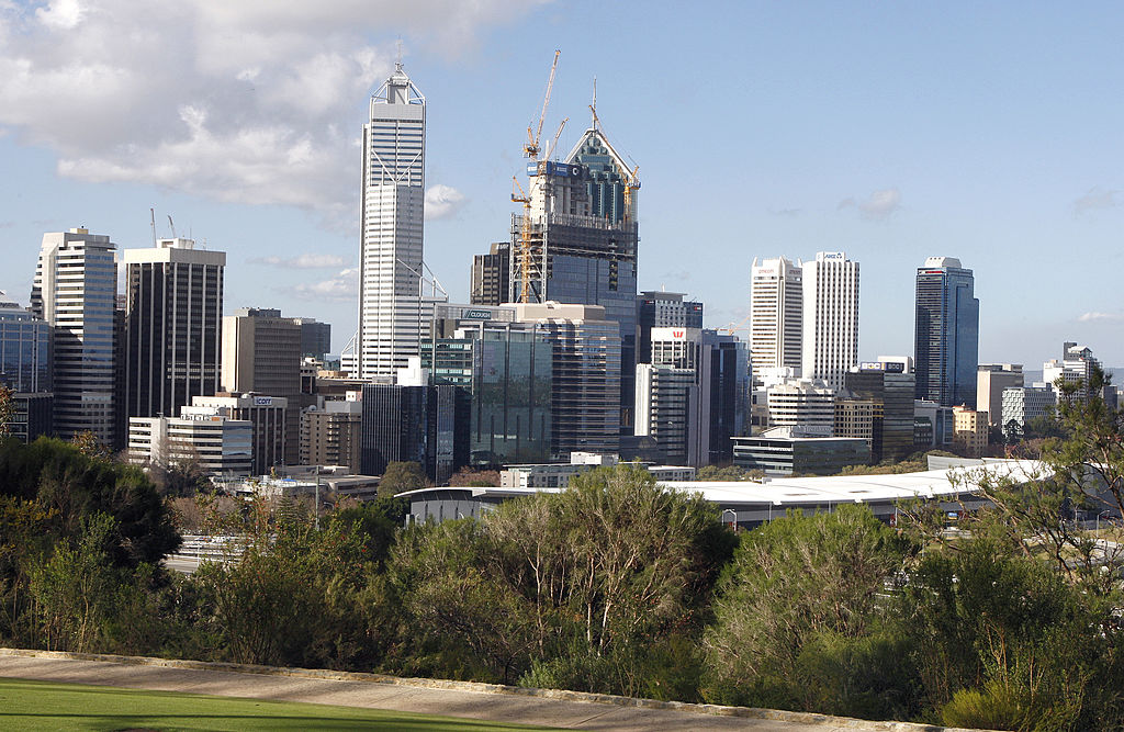 TO GO WITH Australia-vote-mining-Perth,FOCUS by Andrew Pascoe This photo taken on August 5, 2010 shows the Perth central business district skyline viewed from King's Park.  Western Australia is the backbone of a mining boom driving the economy and is a key battleground for the coming election and the residents of the nation's largest state could force a change of government.    AFP PHOTO / Tony ASHBY (Photo credit should read TONY ASHBY/AFP via Getty Images)