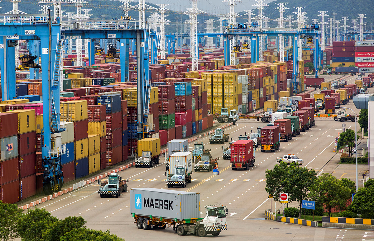 Lines of trucks are seen at a container terminal of Ningbo Zhoushan port in Zhejiang province, China, August 15, 2021. Picture taken August 15, 2021. cnsphoto via REUTERS