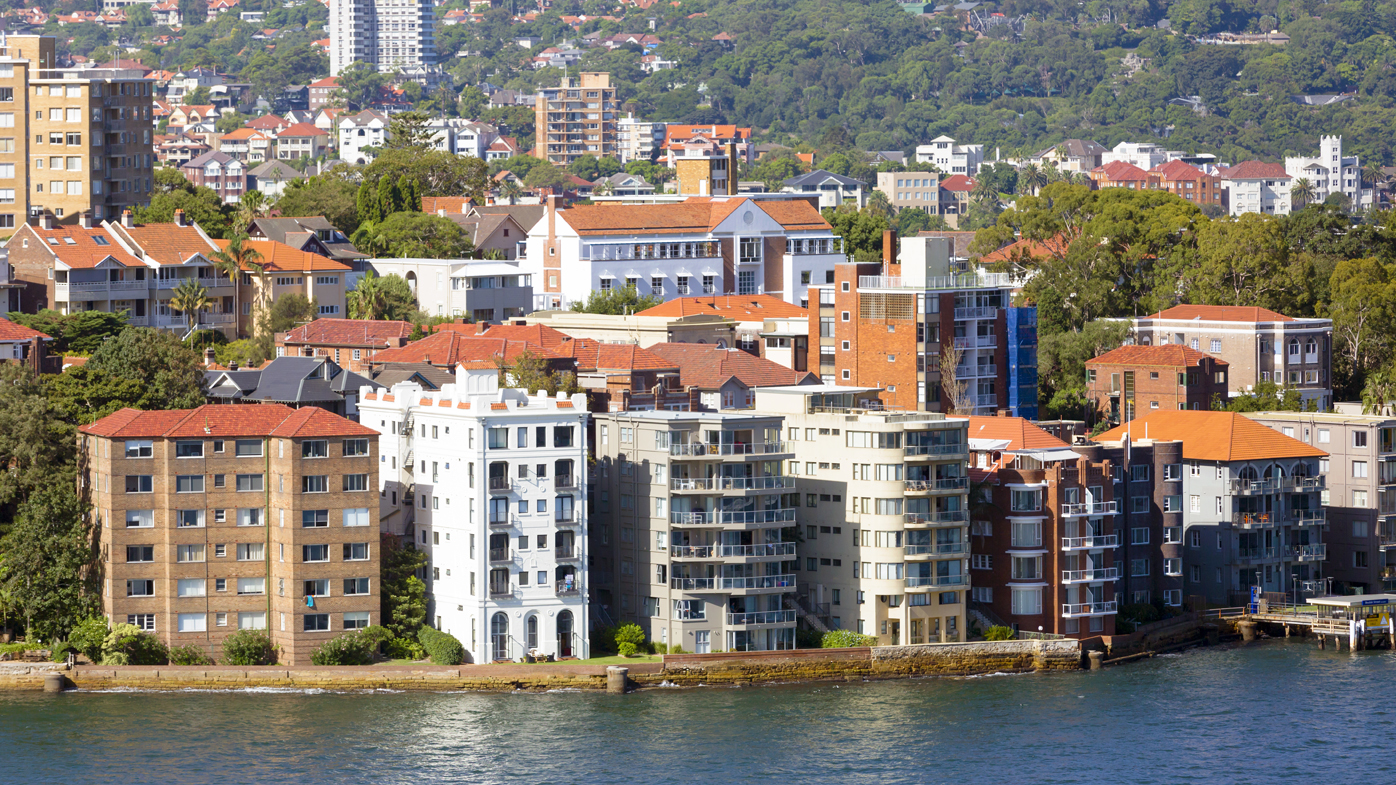 City with apartments buildings, Kirribilli beautiful part of Sydney with houses and ocean coastline, full frame horizontal composition with copy space