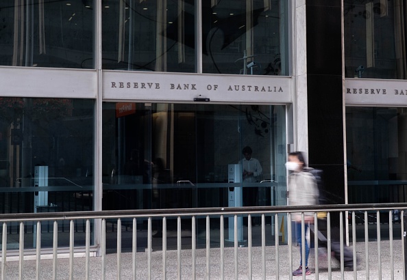 A pedestrian walks past the Reserve Bank of Australia in Sydney, Australia, Sept. 6, 2022.  The Reserve Bank of Australia RBA on Tuesday announced a rate hike for the 5th consecutive month, lifting its cash rate target by 50 basis points to a record high of 2.35 percent since 2015. (Photo by Hu Jingchen/Xinhua via Getty Images)