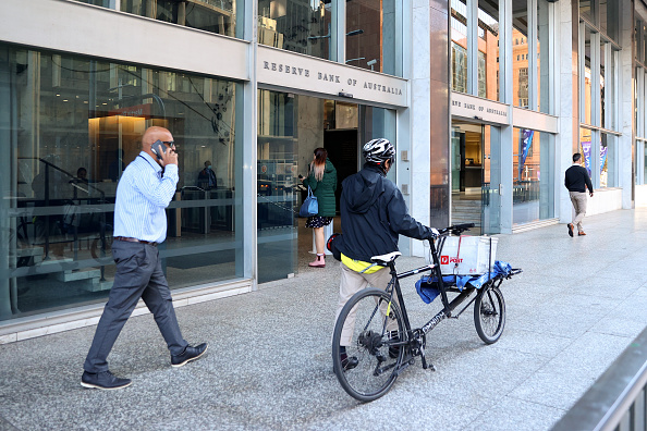 SYDNEY, AUSTRALIA - JUNE 07: Commuters walk past the Reserve Bank of Australia (RBA) building on June 07, 2022 in Sydney, Australia. The Reserve Bank of Australia today raised the cash rate by 0.5% to 0.85%. (Photo by Brendon Thorne/Getty Images)