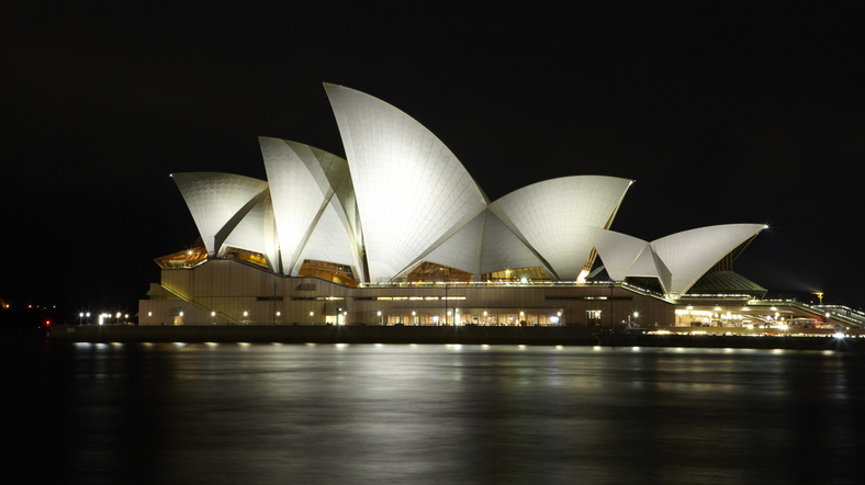 View at night of the iconic Sydney Opera house. The Sydney Opera House designed by Danish architect Jorn Utzon and opened in 1973. Credit: Getty/	Allan Baxter