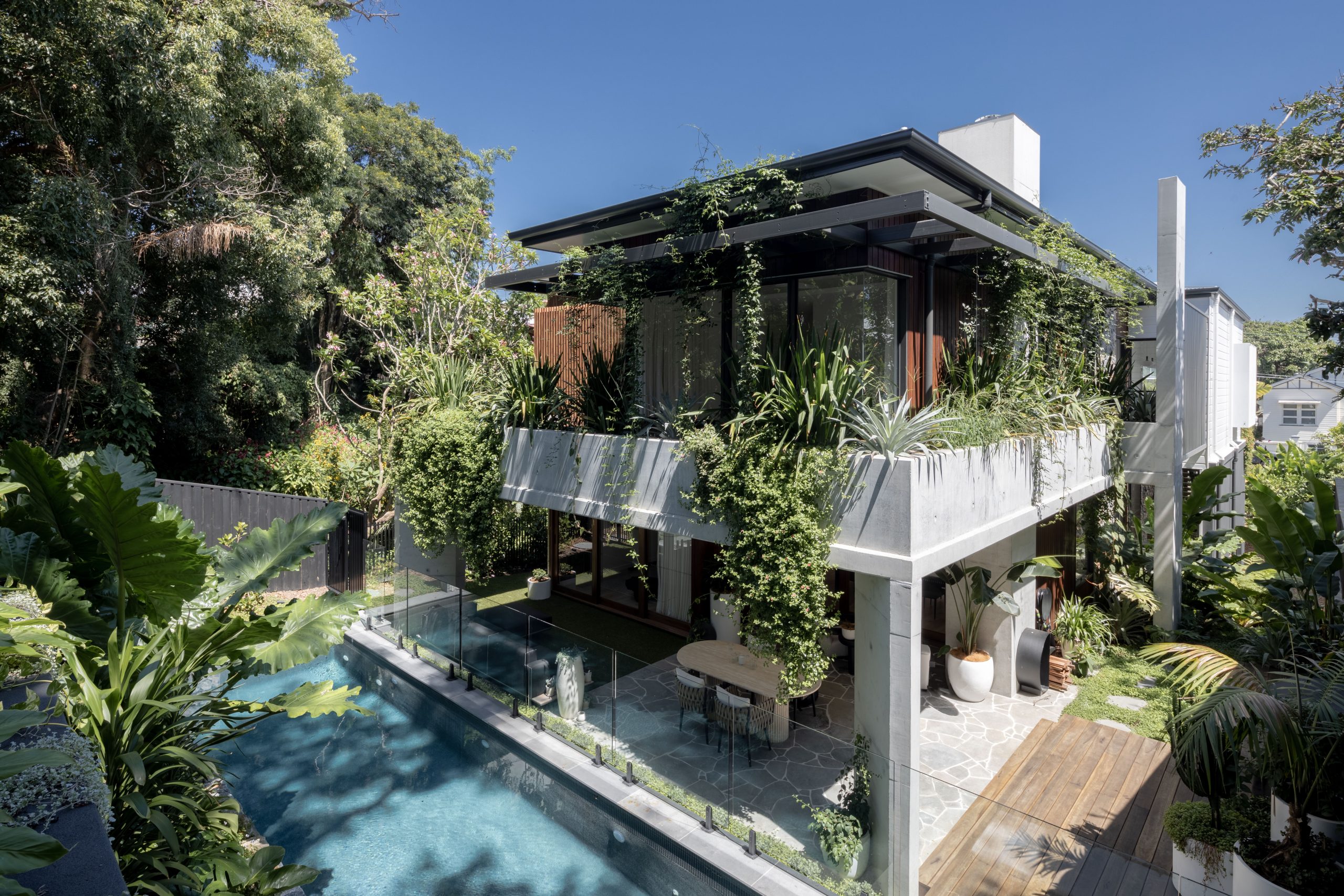 Architect Alexandra Buchanan created a game changing extension to this traditional Queenslander by treating garden and house as one. Image credit: James Peters