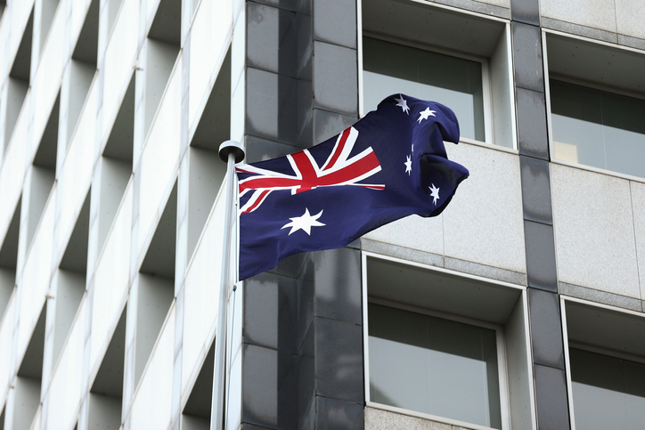 The Australian flag flies outside the Reserve Bank of Australia (RBA) headquarters in Sydney, Australia. Photographer: Brendon Thorne/Bloomberg