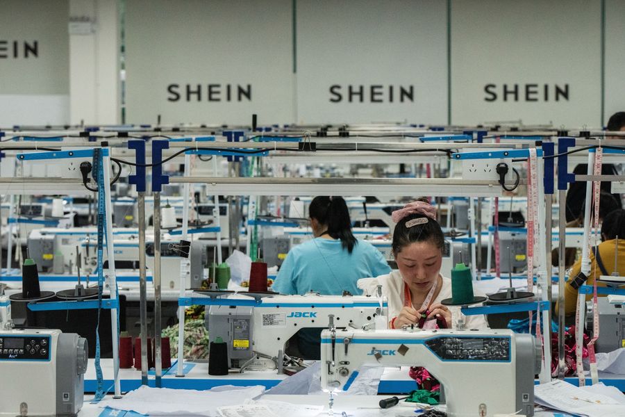 Sewing clothes on a production floor of Shein, known for its ultra-affordable clothes shipped from China. PHOTO: GILLES SABRIE FOR THE WALL STREET JOURNAL
