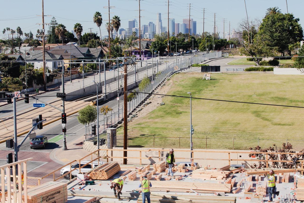 Workers last month at the site of the Lorena Plaza apartment complex in Los Angeles. ALEX WELSH FOR THE WALL STREET JOURNAL