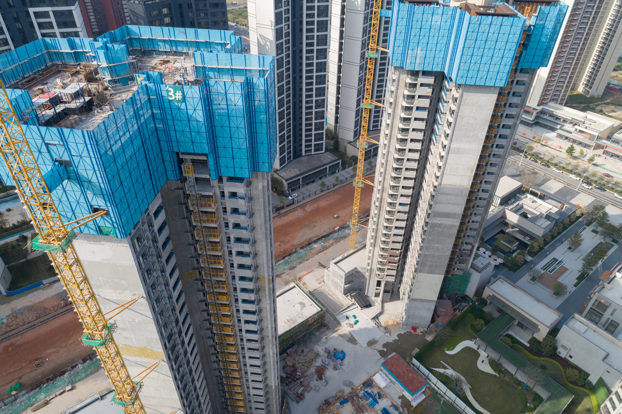 Aerial view of multistory apartment construction site in China. Credit:	lzf/Getty Images