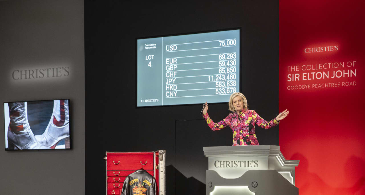 Tash Perrin, deputy chairman, Christie’s Americas, selling a pair of silver leather tall platform boots owned by Elton John for US$94,500.
Courtesy Christie’s Images Ltd. 2024