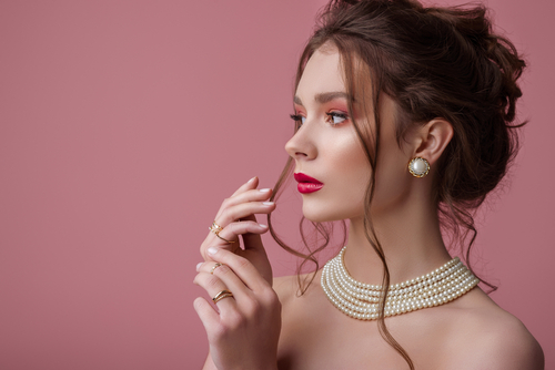 Instead of stringing the old-school pearl necklace along, many of today’s brands make pearl chokers, sometimes with smaller “baby” pearls that sit at mid-neck instead of resting on clavicles. Shutterstock