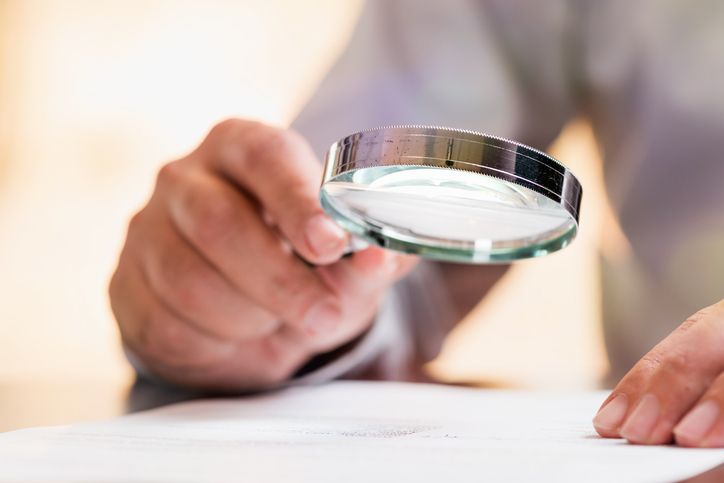 Putting finances under a magnifying glass can make a big difference in retirement. Getty Images